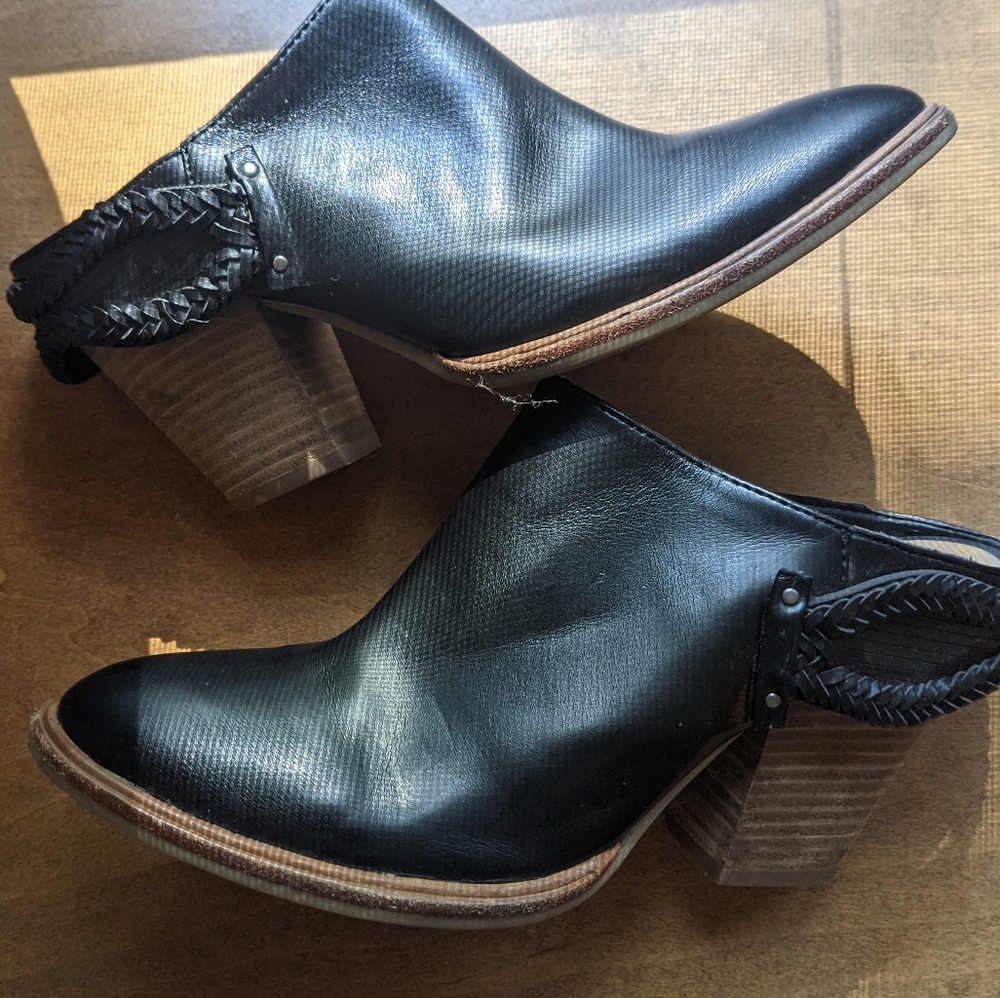 Black clog mules with braided leather details